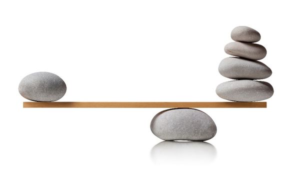 Rocks balancing on board